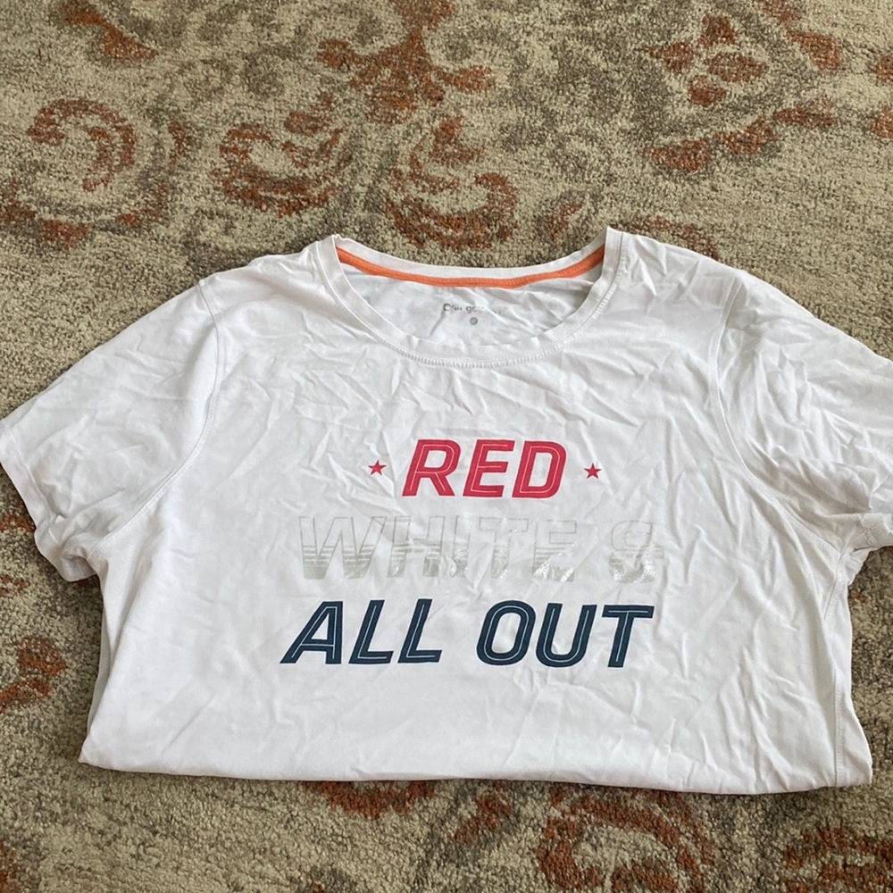 I am selling a Orange theory fitness workout shirt, red, white, and blue